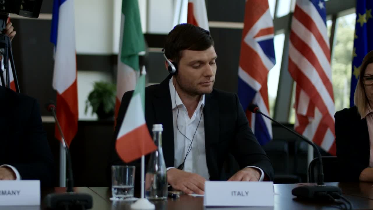 Stock Video Listening To Translation And Applauding Animated Wallpaper