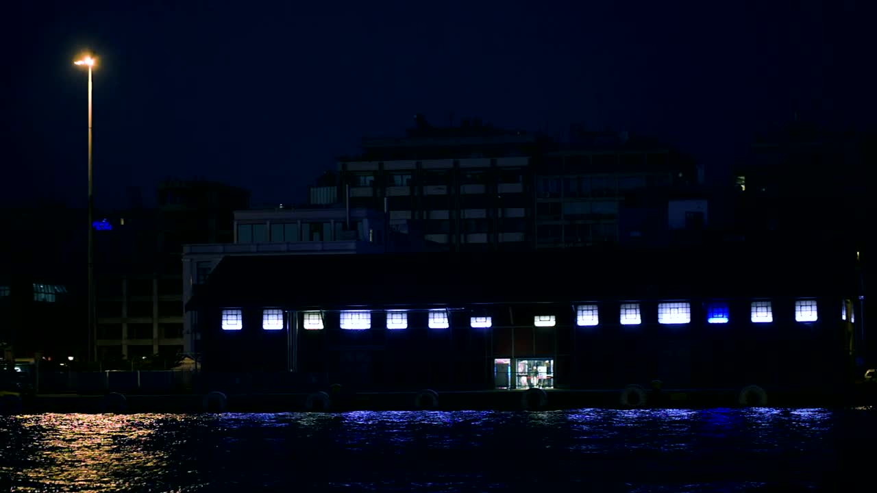 Stock Video Lights At The Waterfront At Night Animated Wallpaper