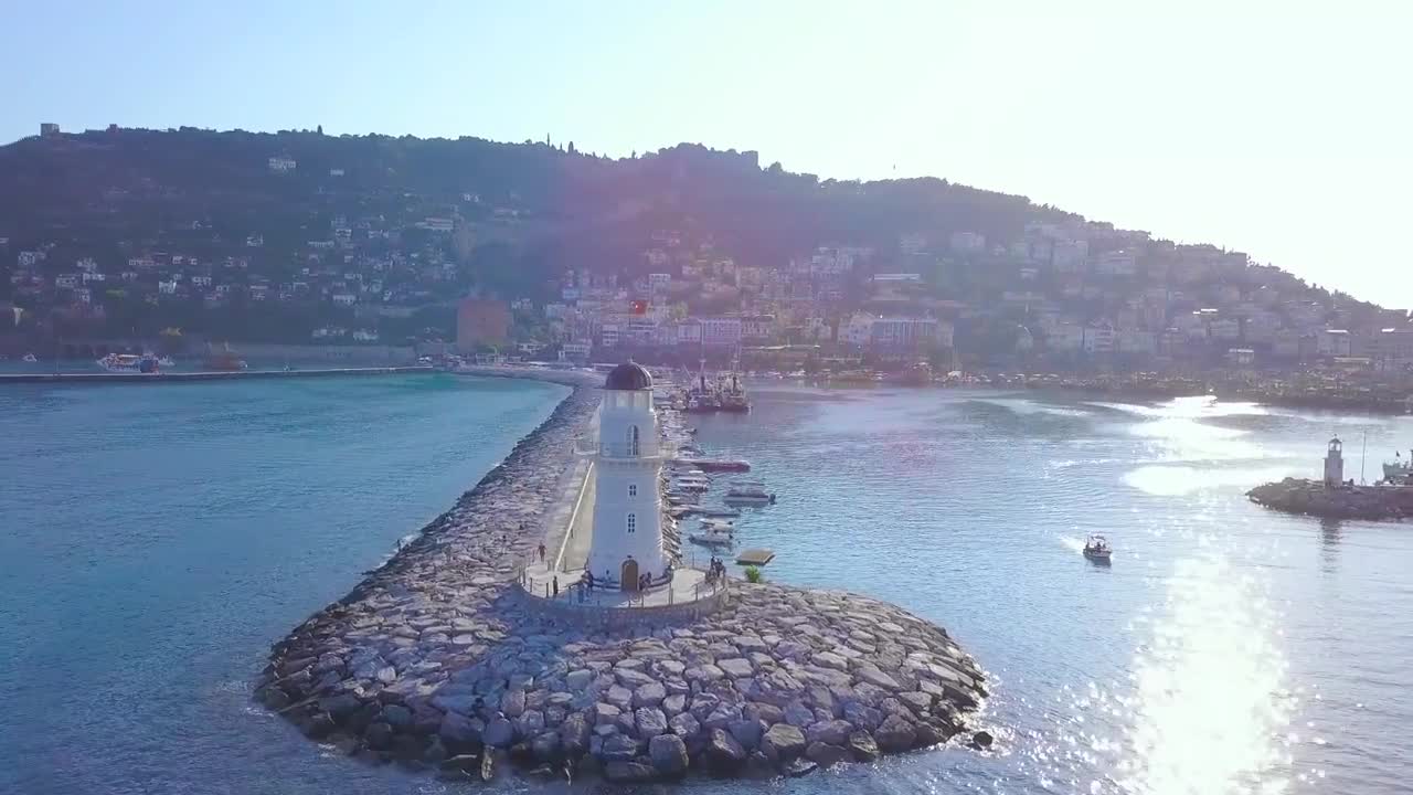Stock Video Lighthouse At The Entrance To A Harbor Animated Wallpaper
