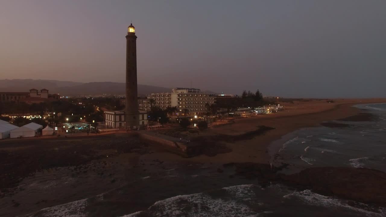 Stock Video Lighthouse And A Hotel At Dusk Animated Wallpaper