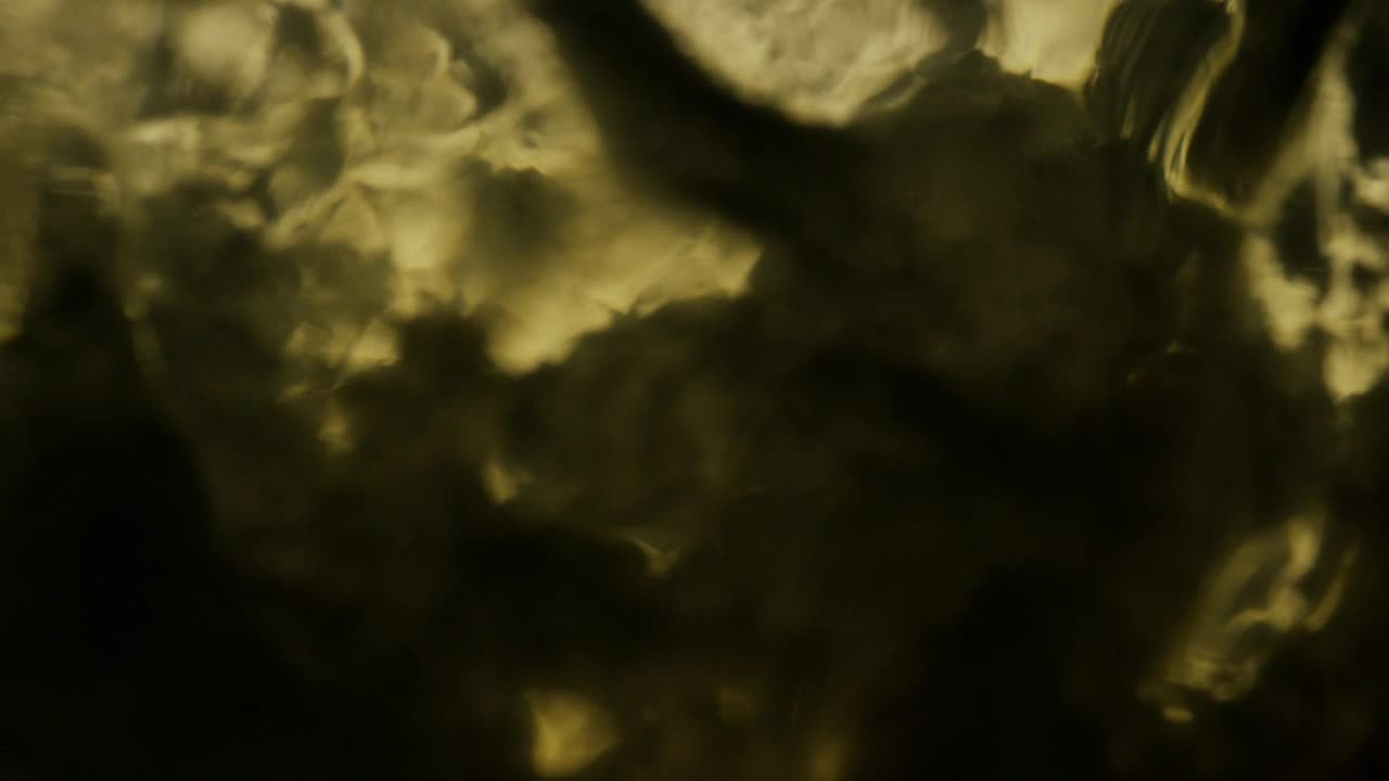 Stock Video Light Through Distorted Glass Texture Animated Wallpaper