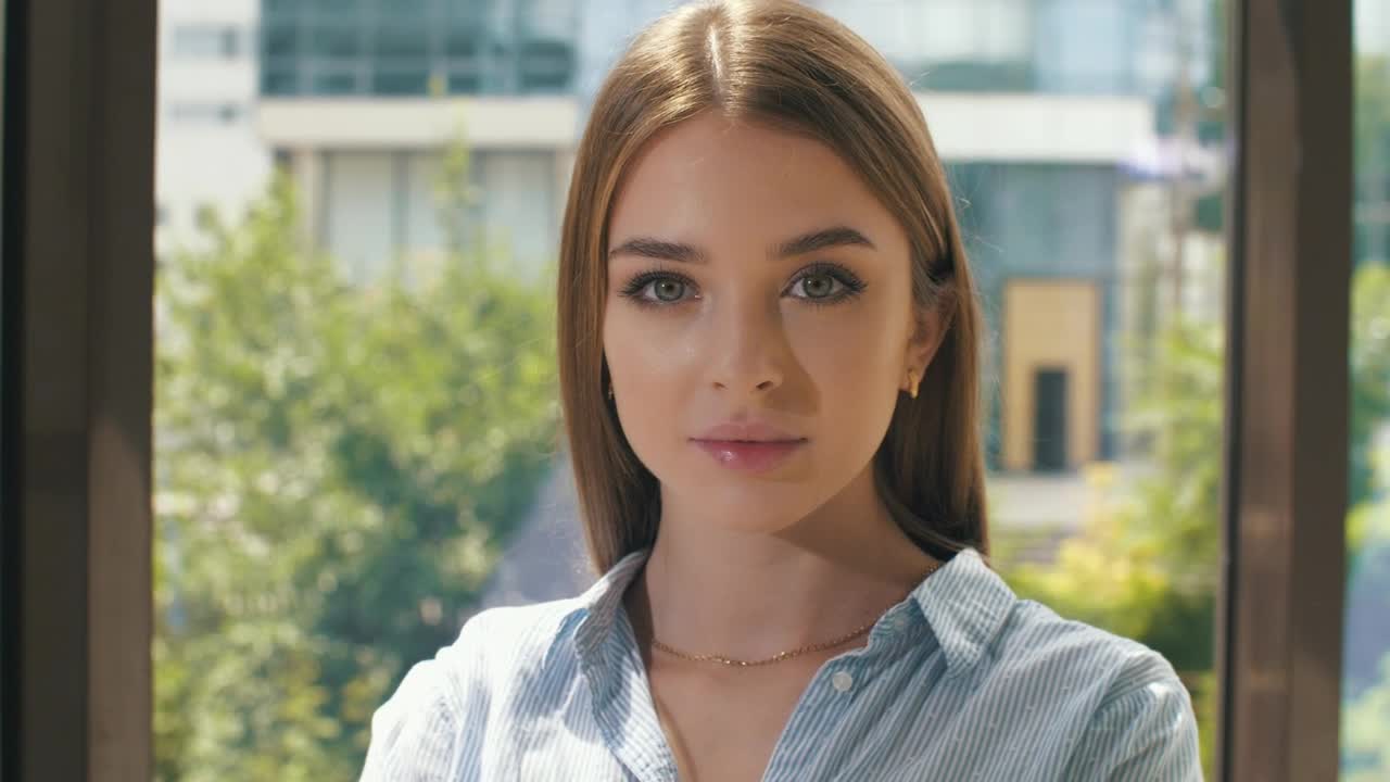 Stock Video Light Eyed Young Woman Portrait Animated Wallpaper