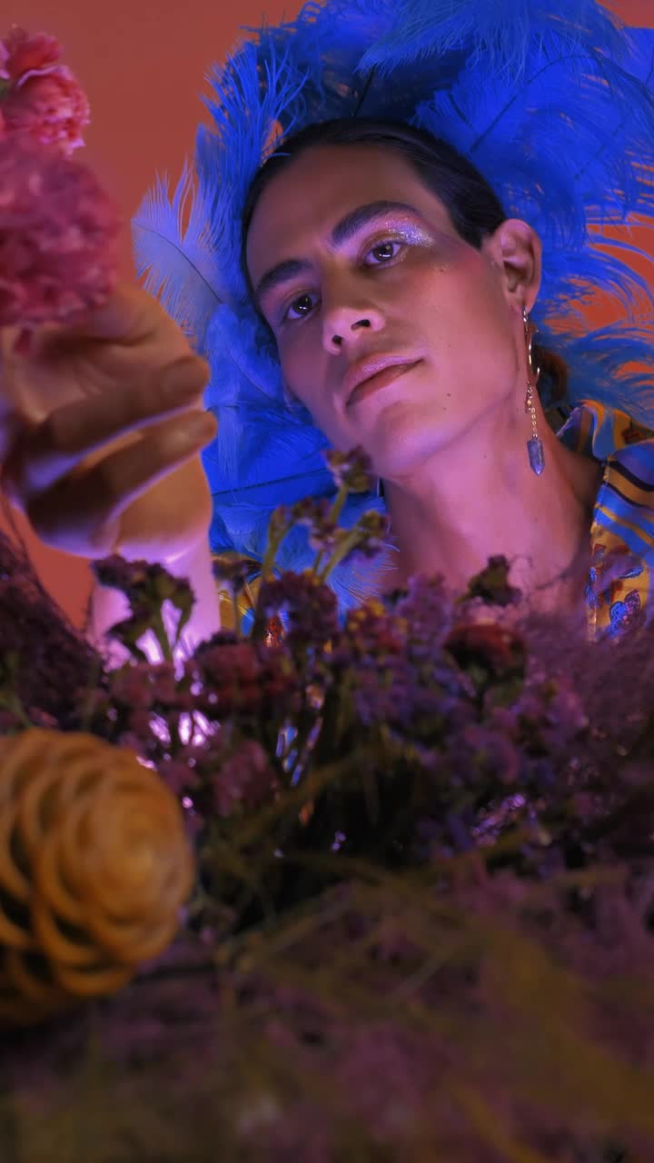 Stock Video Lgbtq Man Appreciating And Smelling Flowers Animated Wallpaper