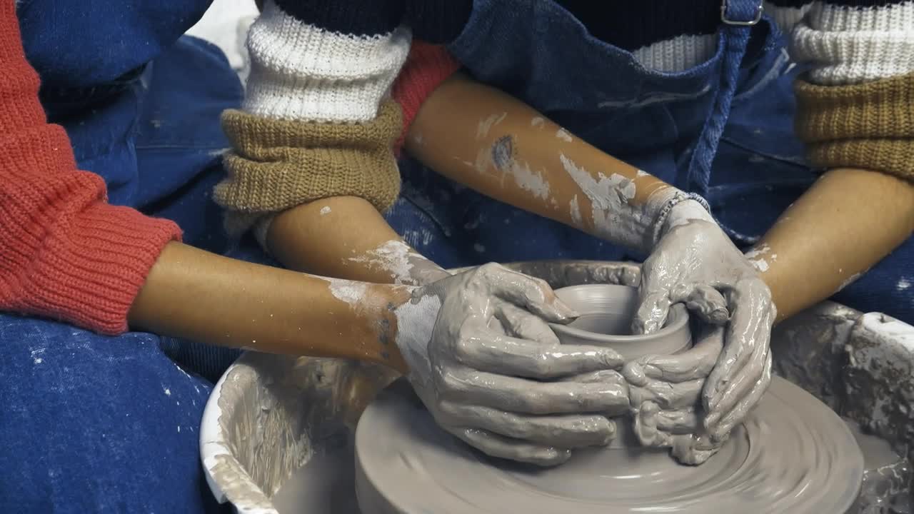 Stock Video Lgbtq Girls Making A Clay Vase Together Animated Wallpaper