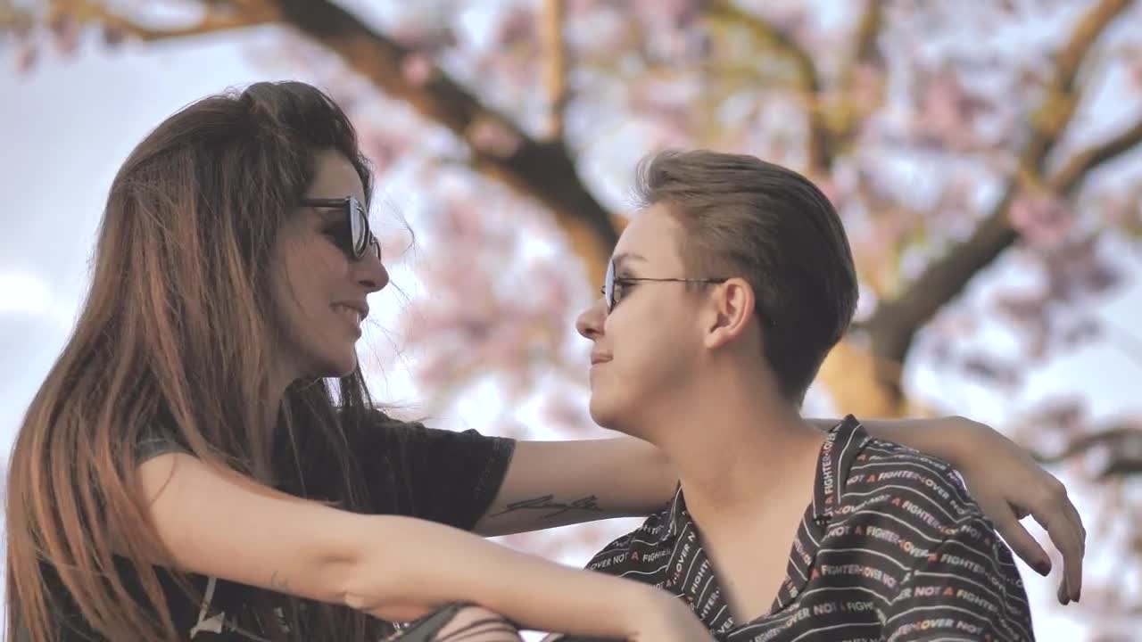 Stock Video Lgbtq Couple In The Park Animated Wallpaper