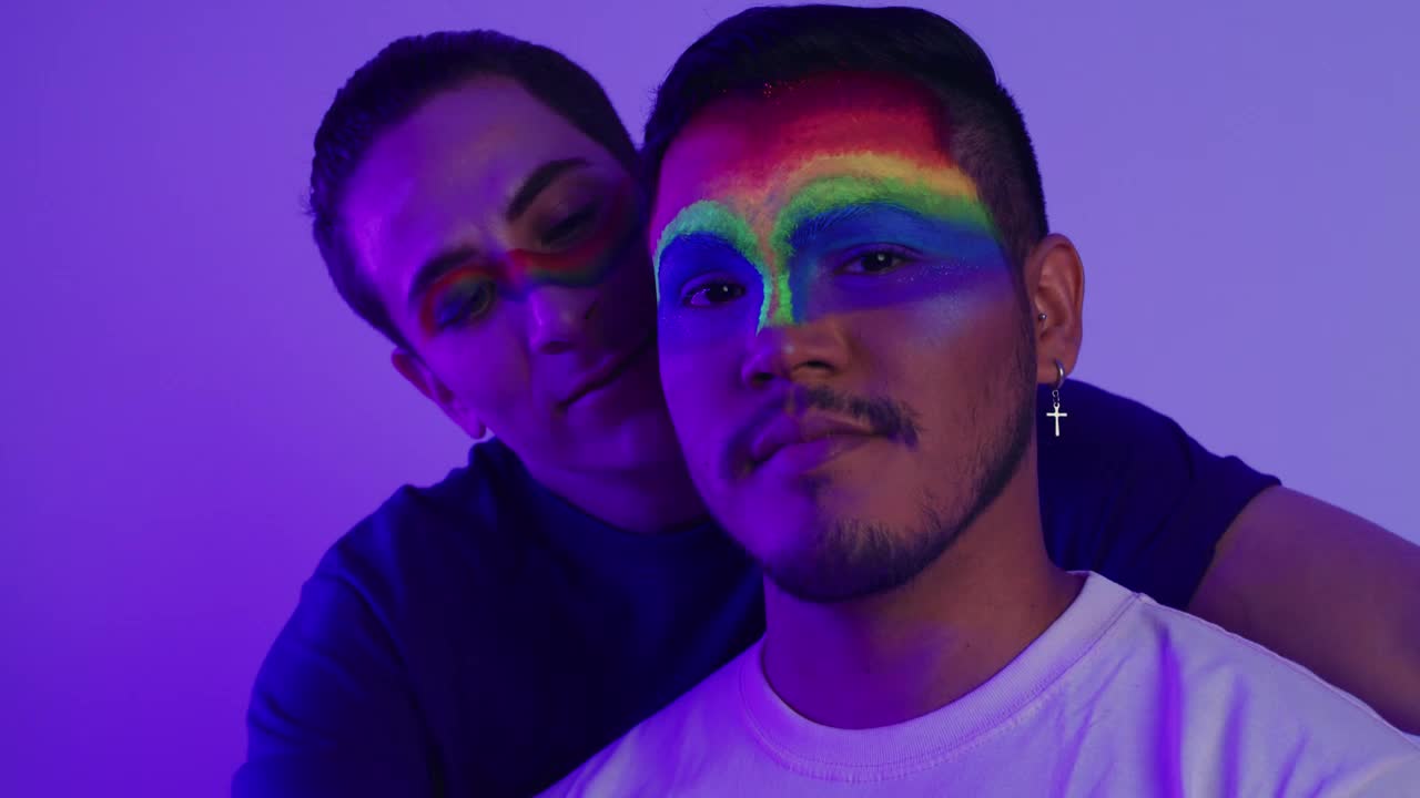Stock Video Lgbt Couple Of Men With Rainbow Makeup Animated Wallpaper