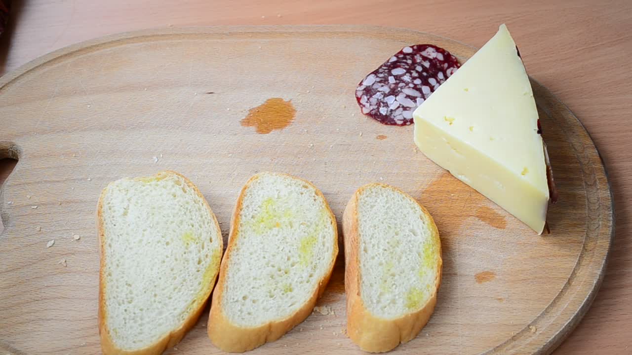 Stock Video Laying Out Sandwich Ingredients Animated Wallpaper