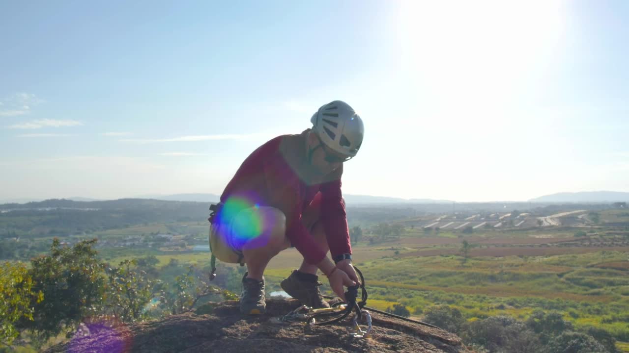 Stock Video Laying A Safety Rope On Top Of The Hill Animated Wallpaper