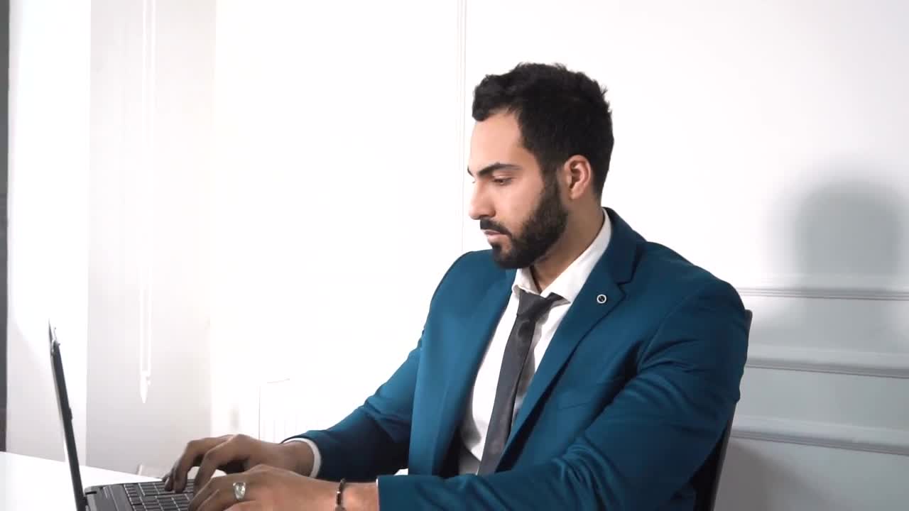 Stock Video Lawyer Types On Laptop In Minimal Office Animated Wallpaper