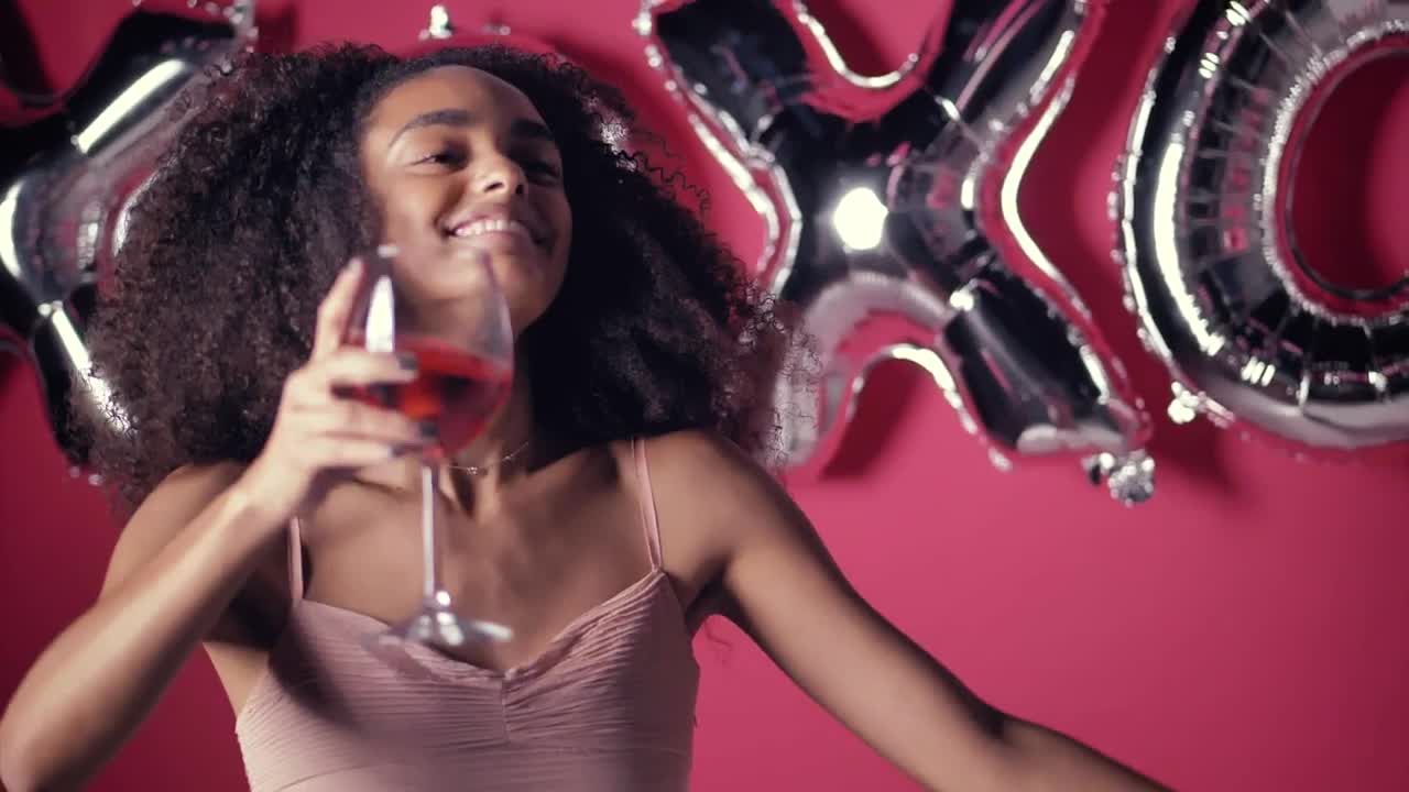 Stock Video Laughing Woman Celebrating With A Glass Of Wine On Valentines Animated Wallpaper