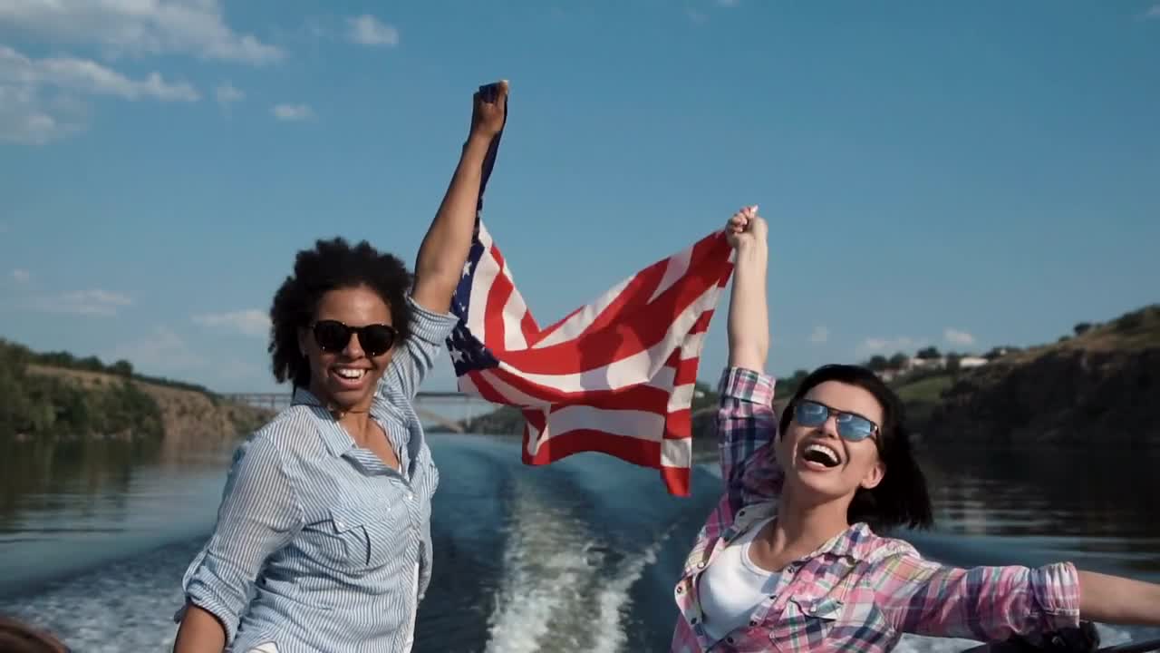 Stock Video Laughing Girls Riding In A Speedboat Animated Wallpaper