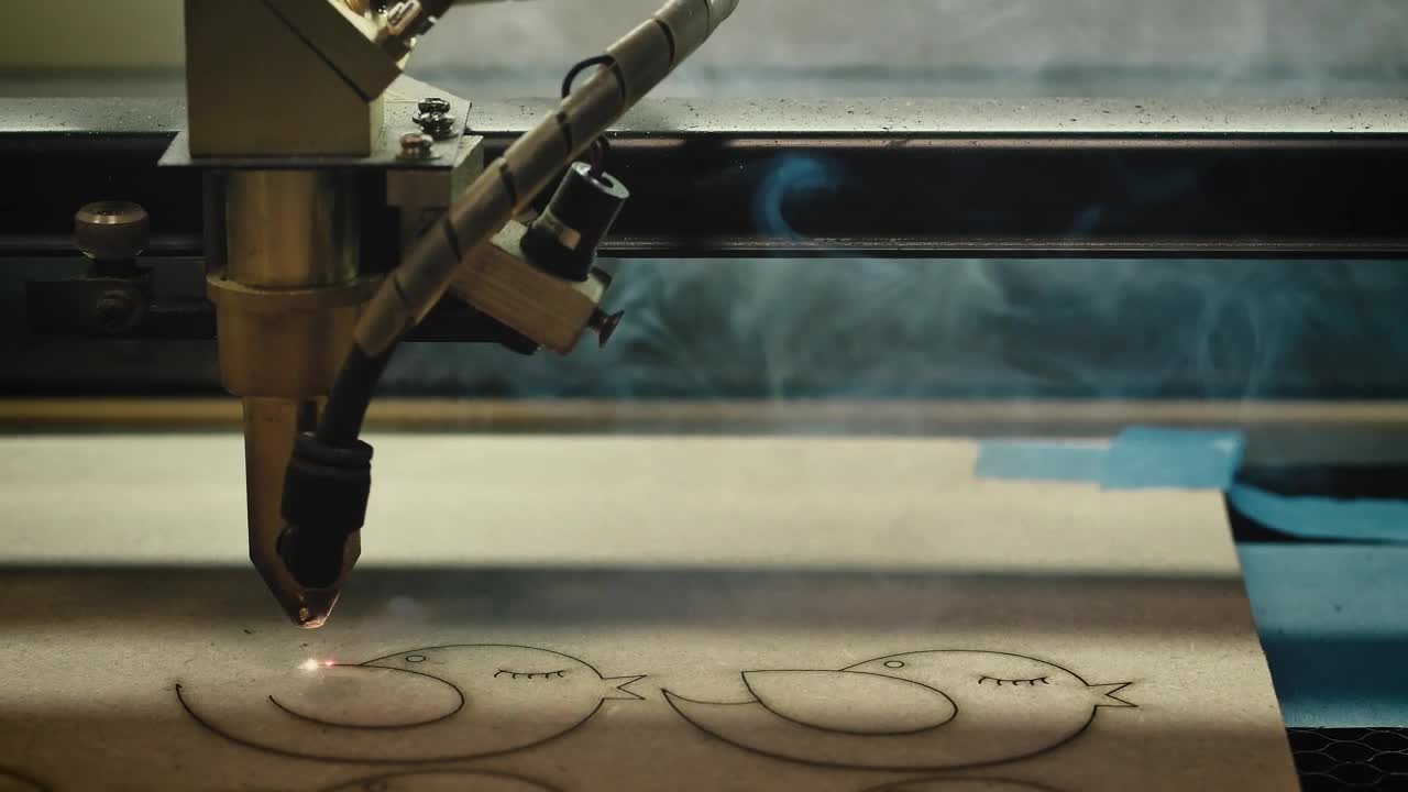 Stock Video Laser Cutter Making Figures Animated Wallpaper