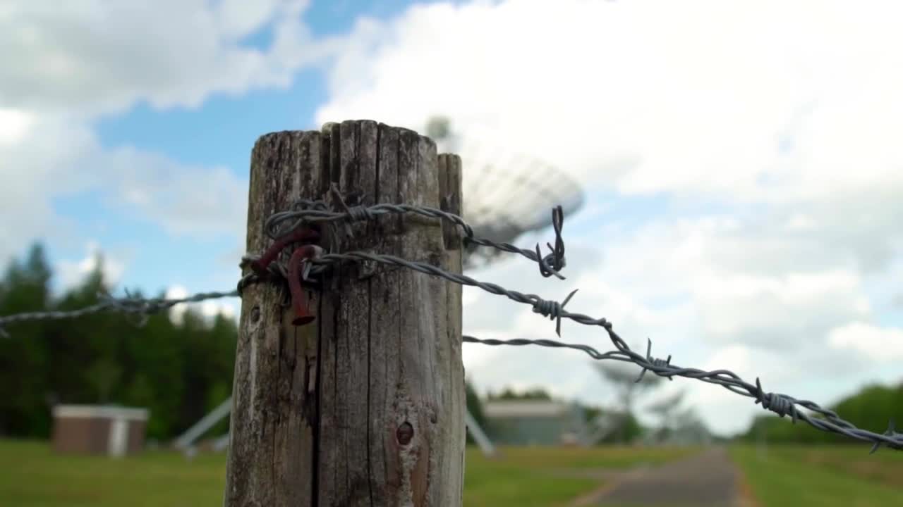 Stock Video Large Satellite Dishes Lined Up In A Meadow Animated Wallpaper
