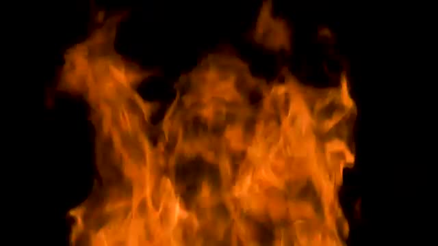 Stock Video Large Orange Flames On Black Background Smal Animated Wallpaper