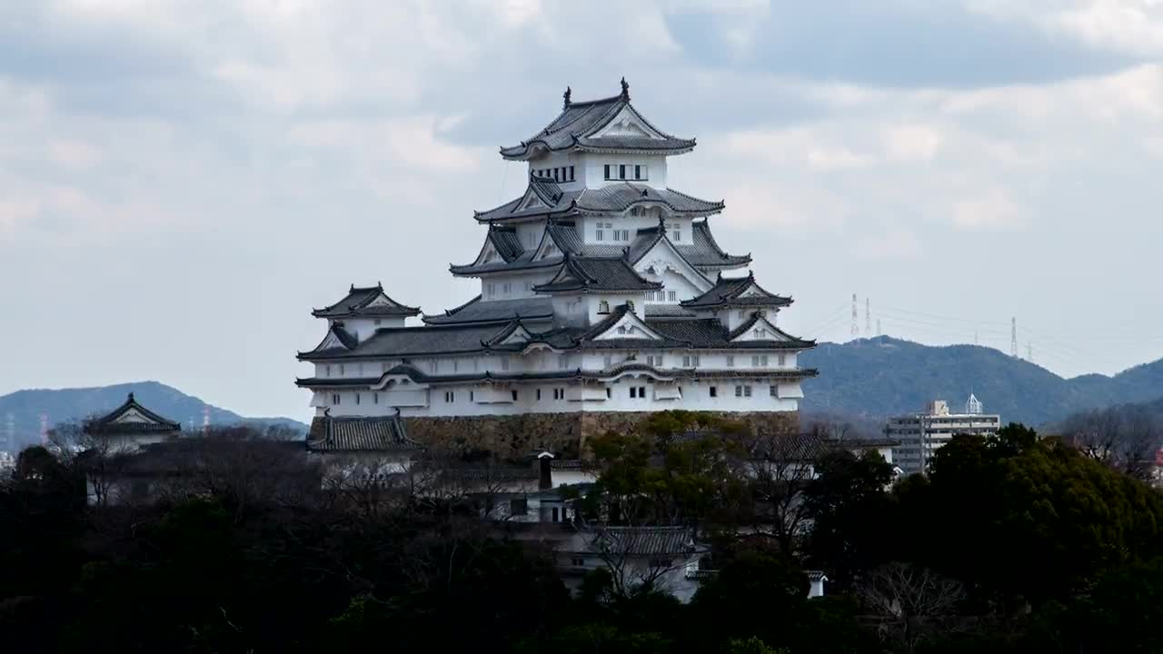Stock Video Large Japanese Building Sticking Out From The Trees Animated Wallpaper