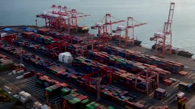 Stock Video Large Container Area On A Cargo Ship Shoreline Aerial View Smal Animated Wallpaper