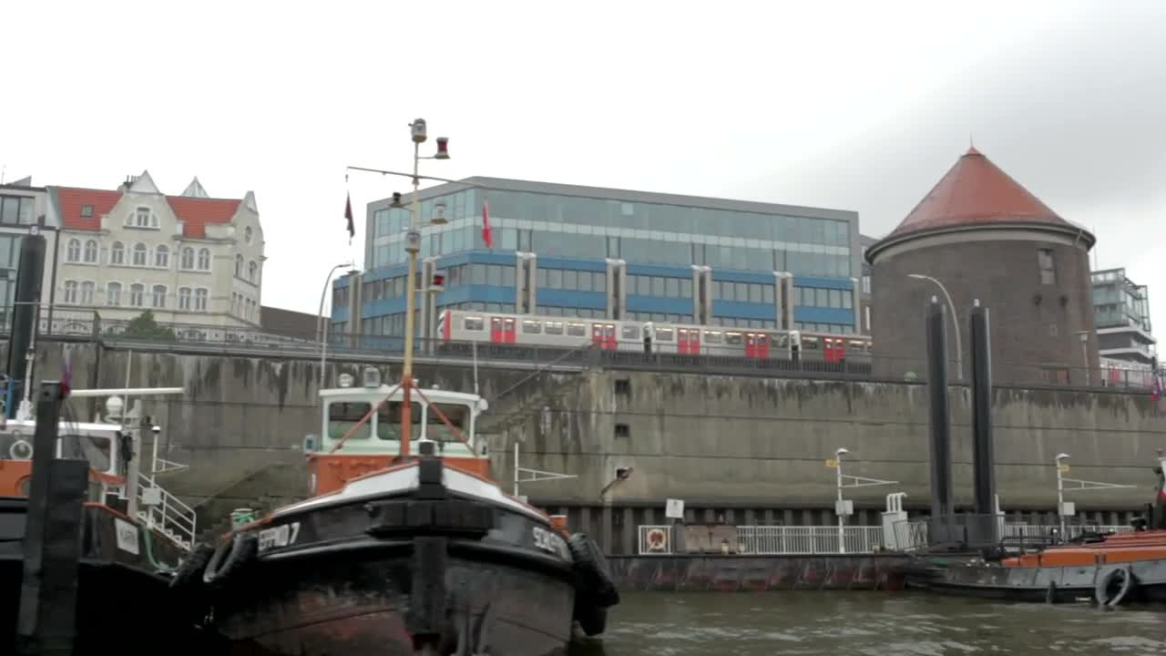 Stock Video Large Boats Docked In A City River Animated Wallpaper