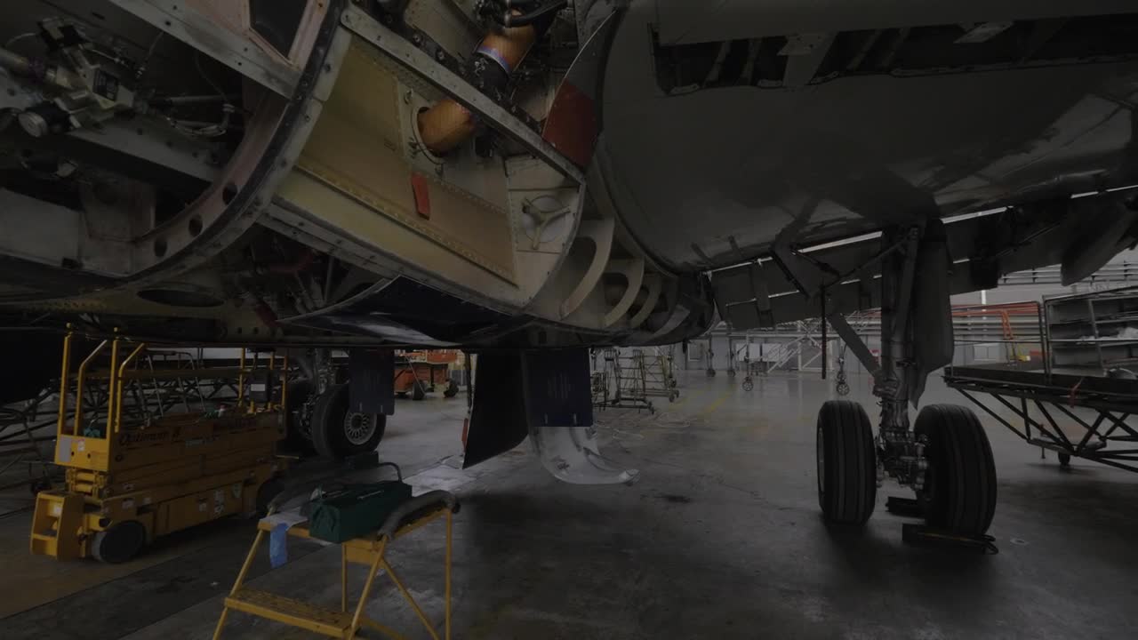Stock Video Large Aircraft In Maintenance Animated Wallpaper