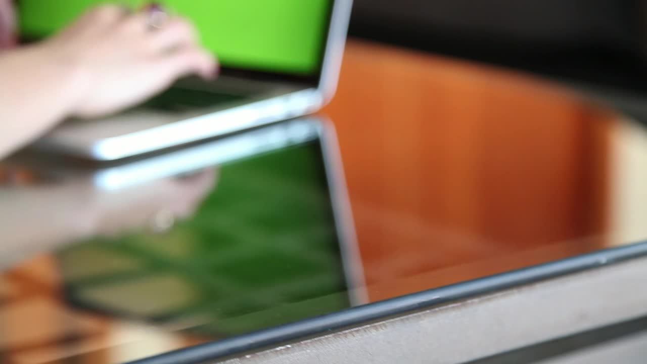 Stock Video Laptop With A Green Screen Animated Wallpaper