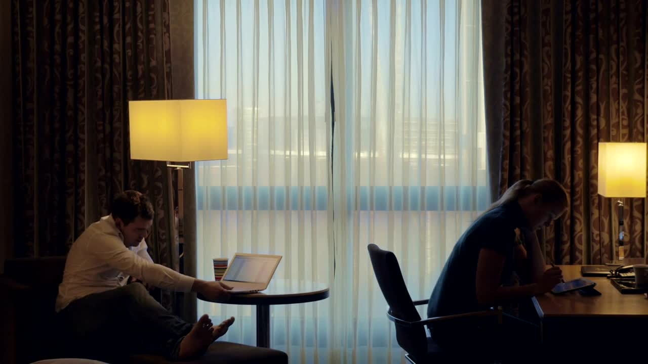 Stock Video Laptop And Tablet In A Hotel Room Animated Wallpaper