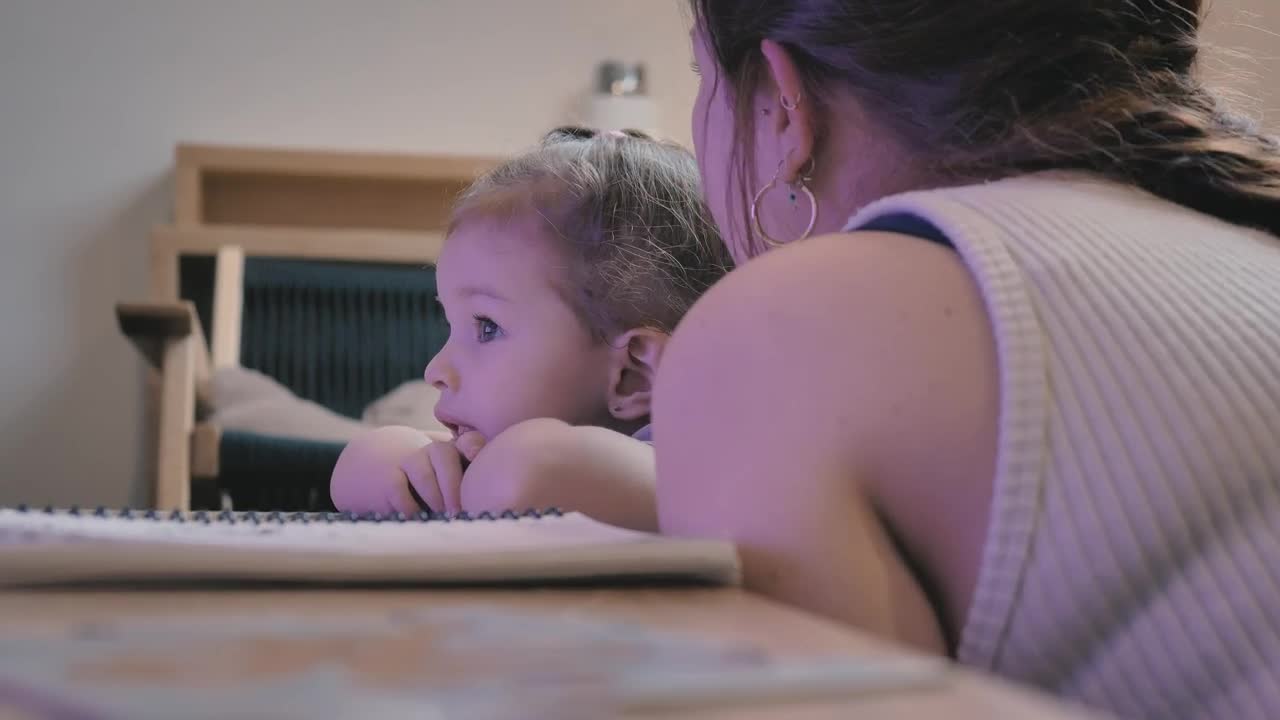 Stock Video Mother Talks To Her Daughter Who Watches T Animated Wallpaper
