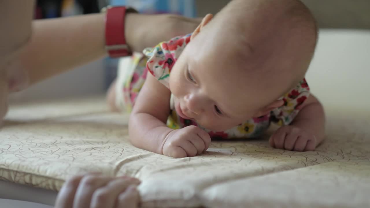 Stock Video Mother Rubbing Her Young Bab Animated Wallpaper