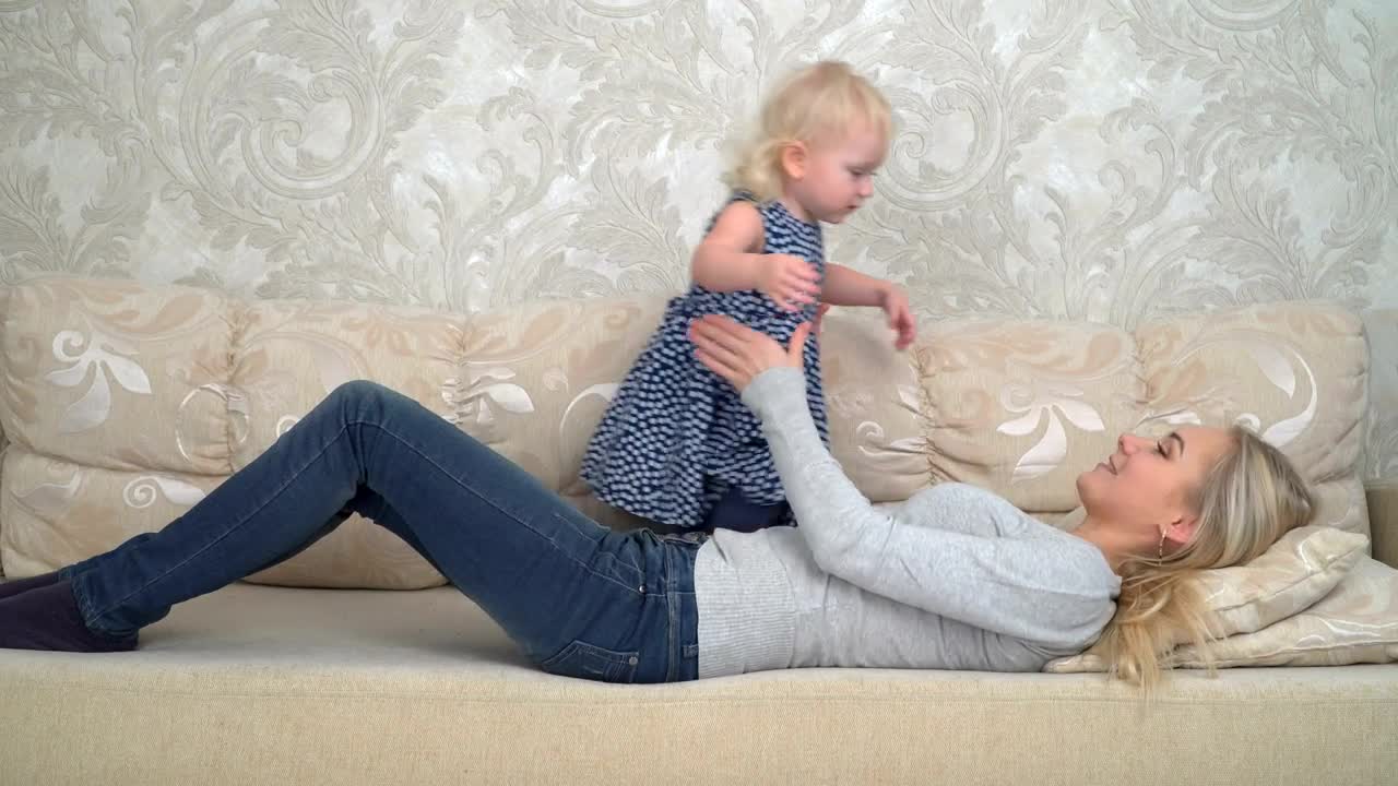 Stock Video Mother Kissing Her Young Chil Animated Wallpaper