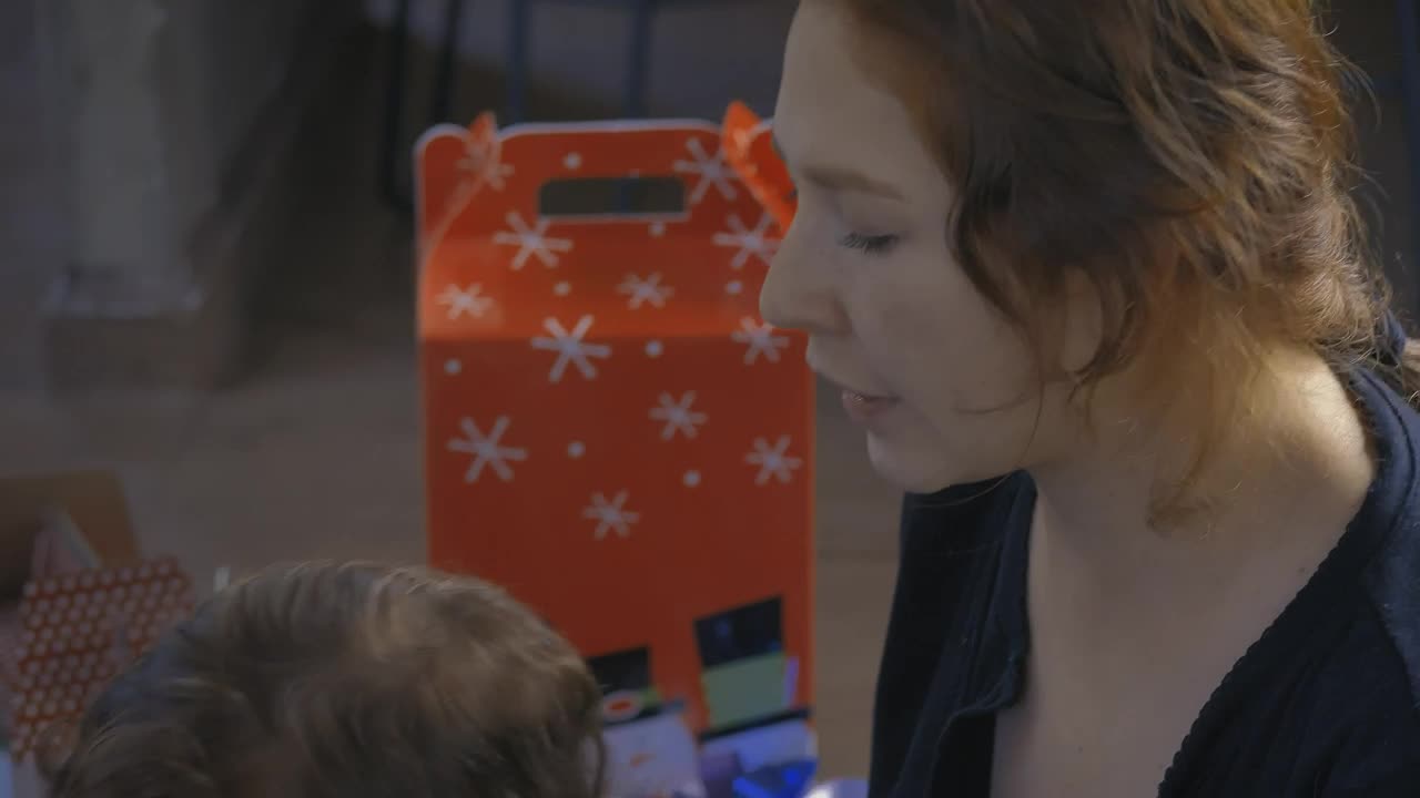 Stock Video Mother Combing Her Little Daughter Sitting On The Floo Animated Wallpaper