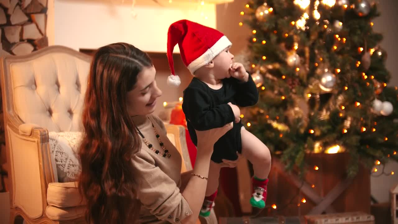 Stock Video Mother Appreciating Her Baby Holding Him In Her Arm Animated Wallpaper