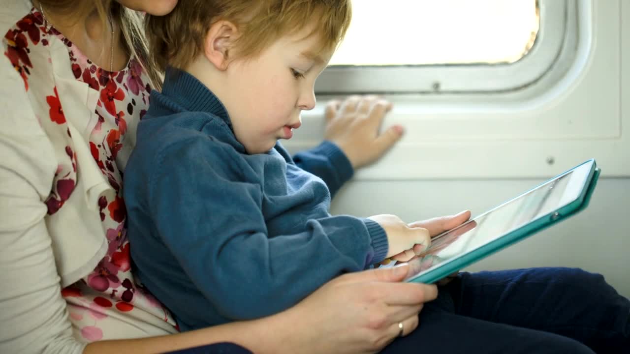 Stock Video Mother And Young Child Using A Table Animated Wallpaper