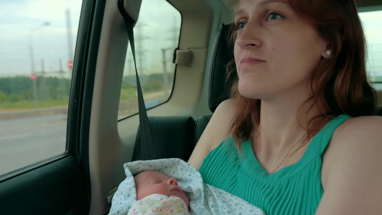 Stock Video Mother And Newborn Driving Hom Animated Wallpaper
