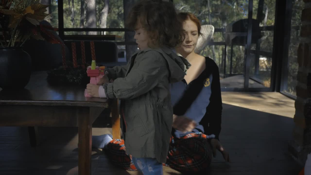 Stock Video Mother And Daughter Playing With Gifts At Christma Animated Wallpaper