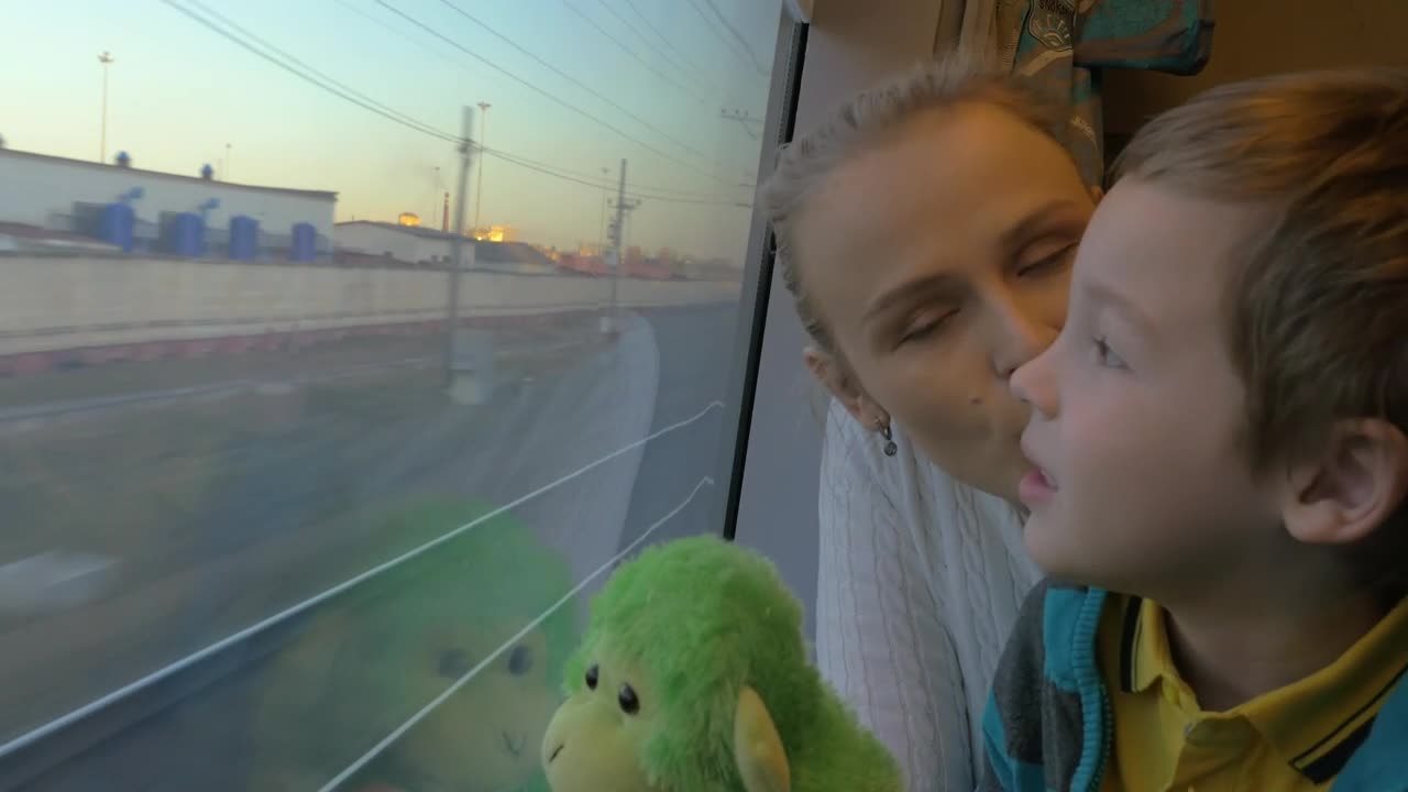 Stock Video Mother And Child Sharing A Train Journe Animated Wallpaper
