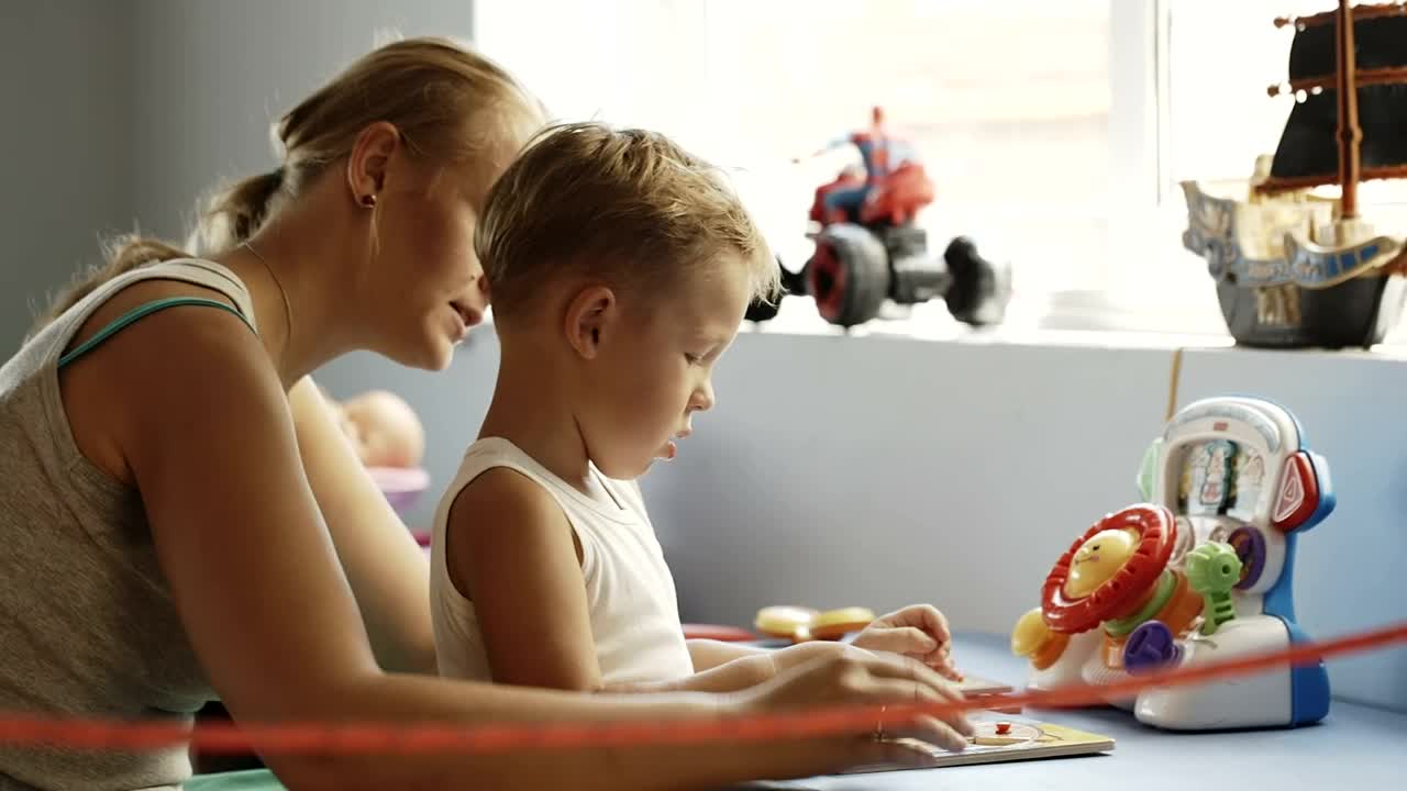 Stock Video Mother And Child Playing With Learning Block Animated Wallpaper
