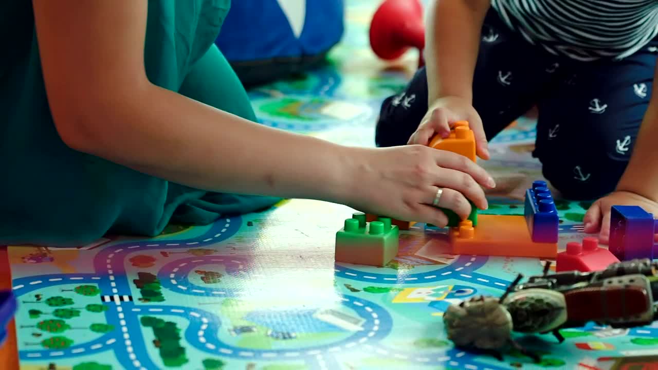 Stock Video Mother And Child Building With Block Animated Wallpaper