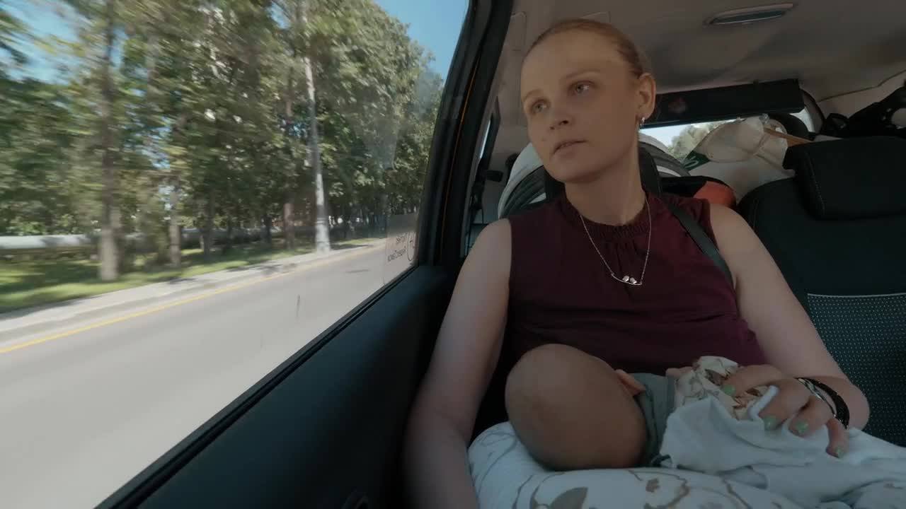 Stock Video Mother And Baby On A Road Tri Animated Wallpaper