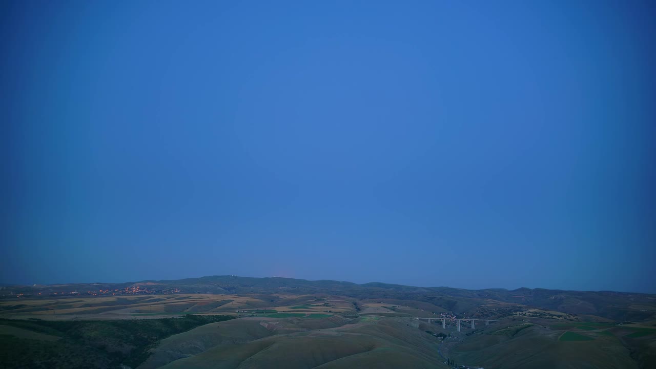 Stock Video Moonrise In A Mountain City Landscap Animated Wallpaper