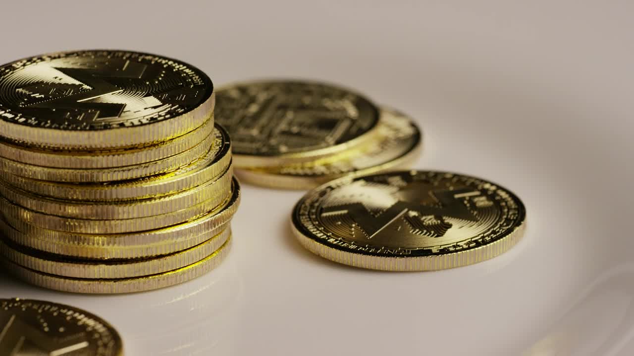 Stock Video Monero Coins Rotating On A White Surfac Animated Wallpaper