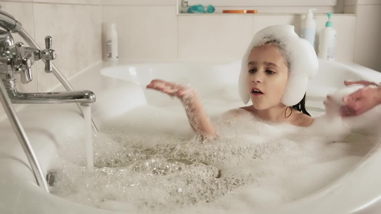 Stock Video Mom Bathing Her Daughte Animated Wallpaper