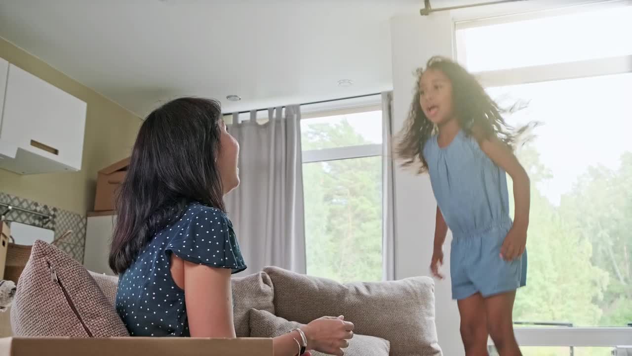 Stock Video Mom And Daughter Playing On A Couc Animated Wallpaper