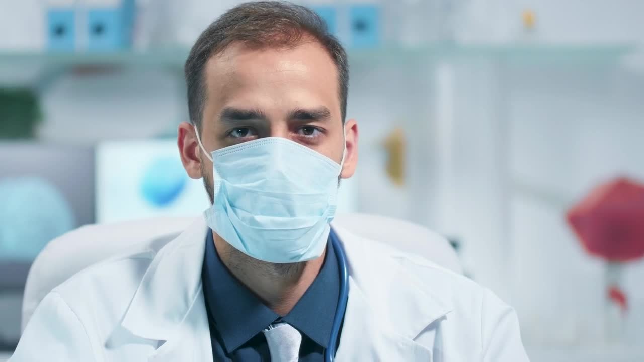 Stock Video Modern Hospital Doctor In Face Mask Noddin Animated Wallpaper
