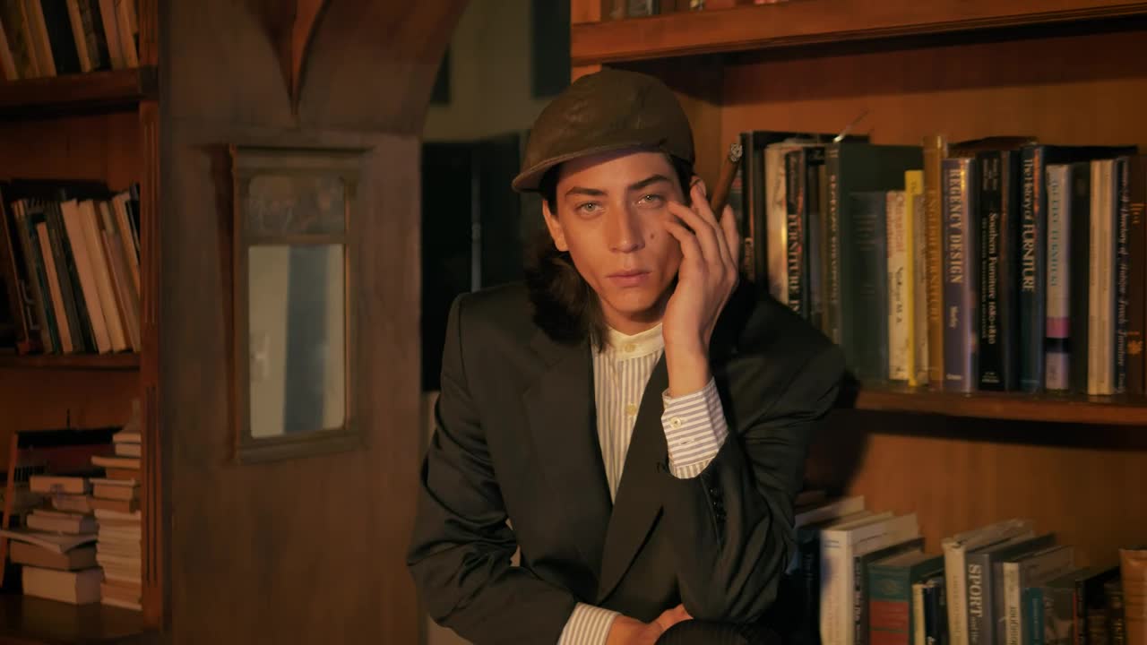 Stock Video Model Dressed Old Fashion Smoking In An Old Fashioned Bookstor Animated Wallpaper