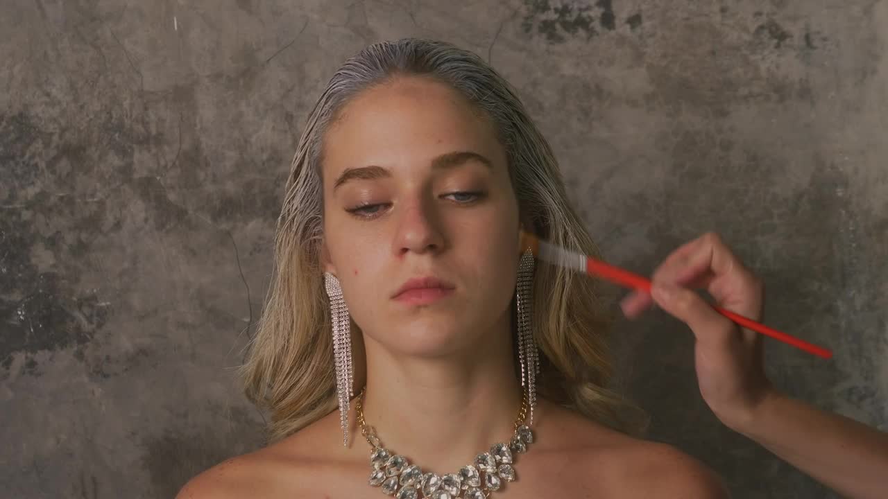 Stock Video Model Being Made Up Looking At The Camer Animated Wallpaper