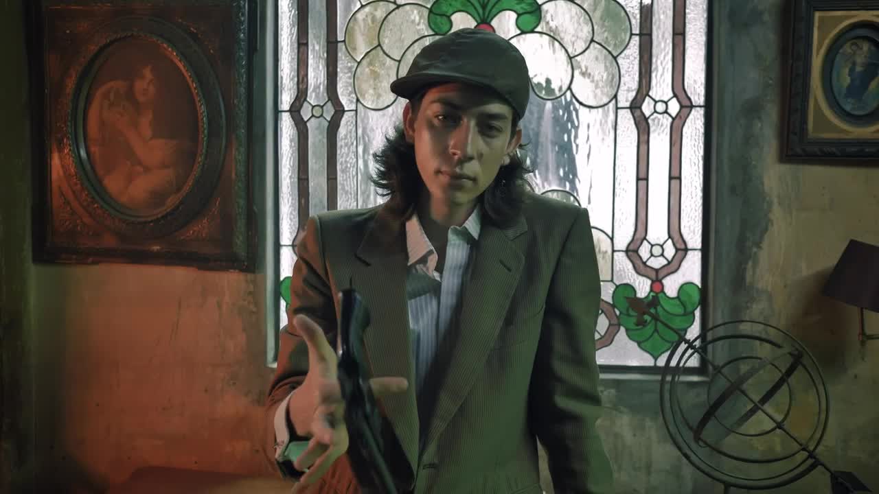 Stock Video Mobster Aiming His Pistol In An Old Fashioned Settin Animated Wallpaper