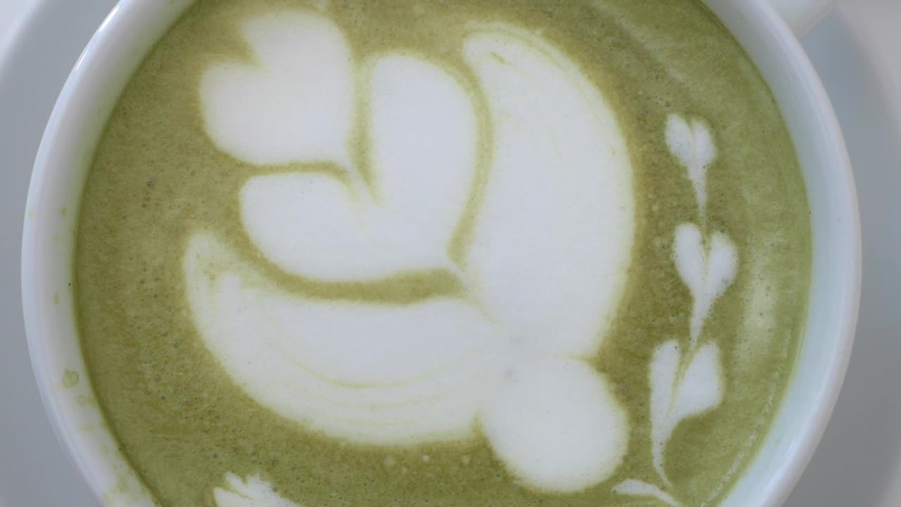 Stock Video Mixing The Cream On A Latt Animated Wallpaper