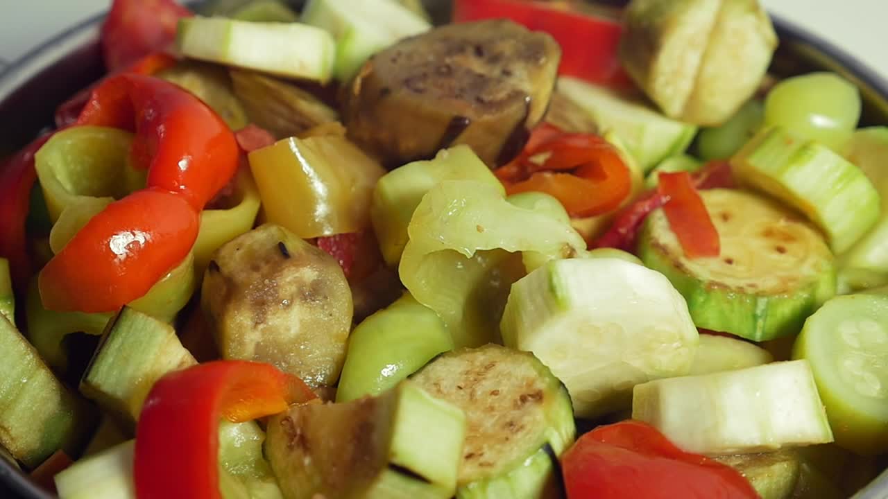 Stock Video Mixing Fresh Vegetables On A Stov Animated Wallpaper