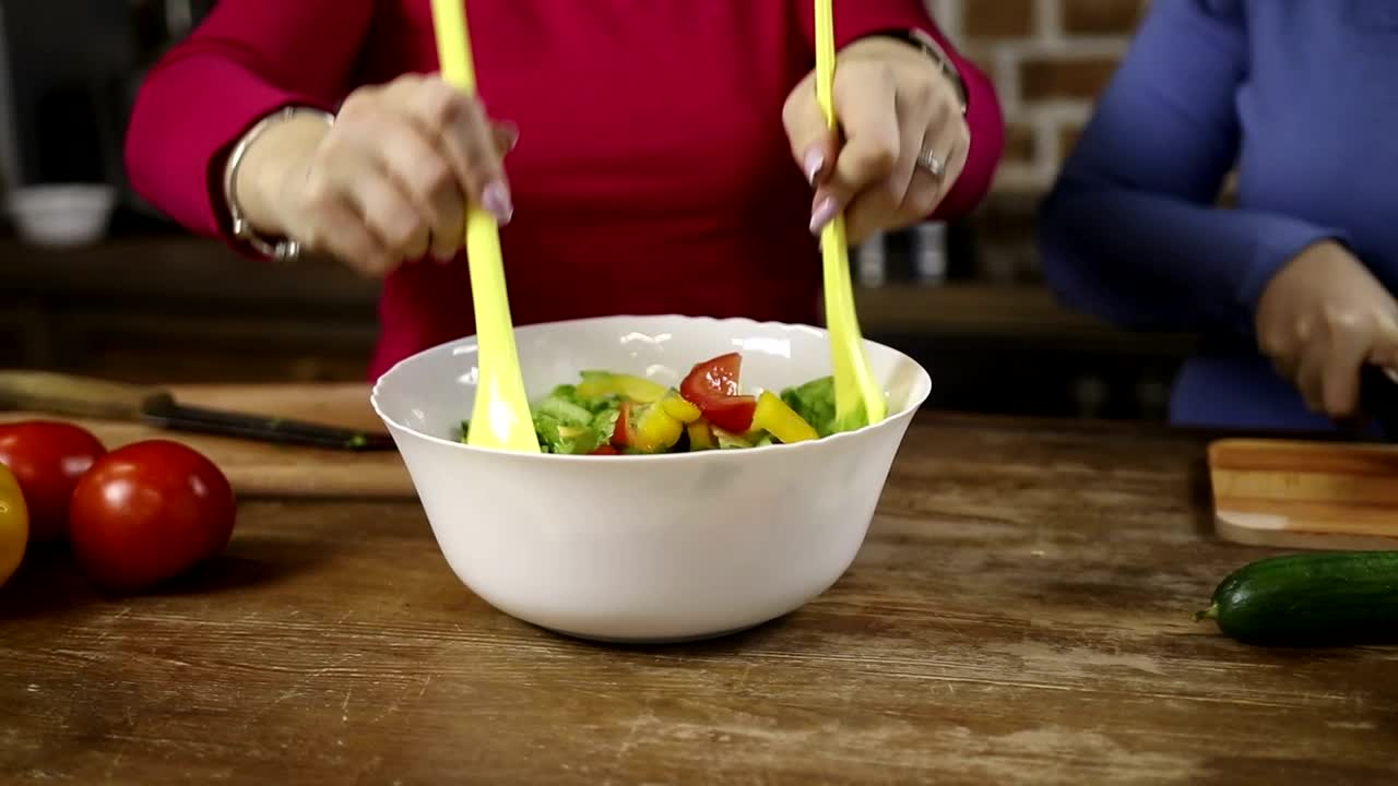 Stock Video Mixing A Vegetable Sala Animated Wallpaper