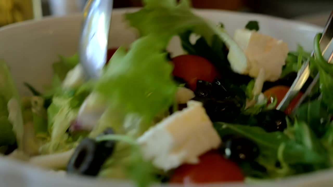 Stock Video Mixing A Salad Ready For Serving Guest Animated Wallpaper