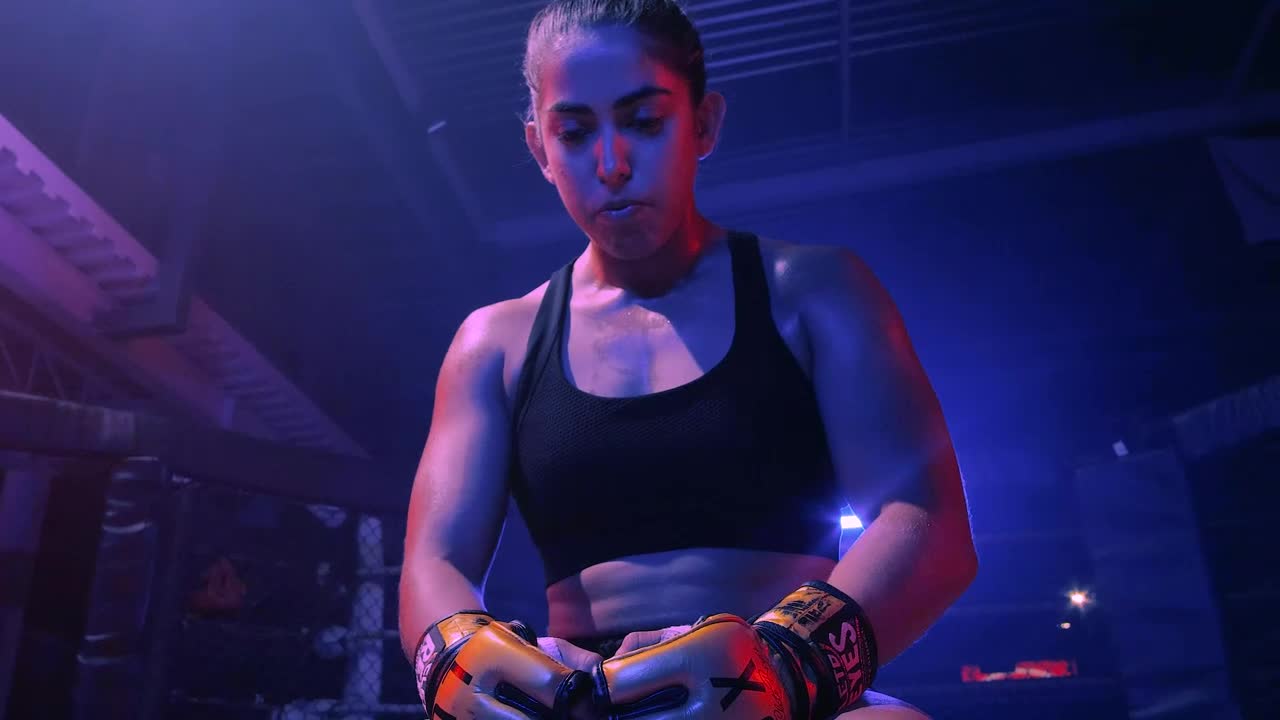 Stock Video Mixed Martial Arts Fighter Sitting In A Rin Animated Wallpaper
