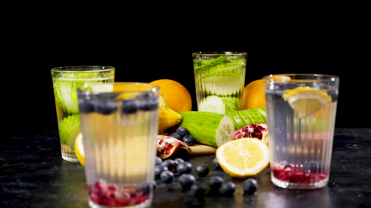 Stock Video Mixed Fruit Drinks On A Tabl Animated Wallpaper